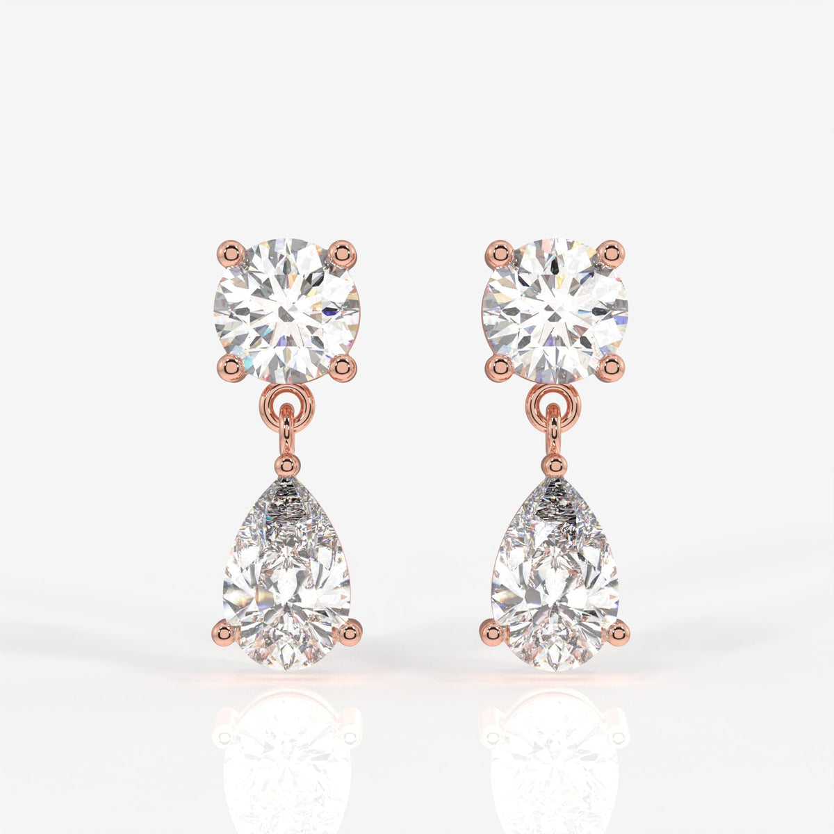 Round and Pear Cut Moissanite Diamond Dangle Sterling Silver Earrings