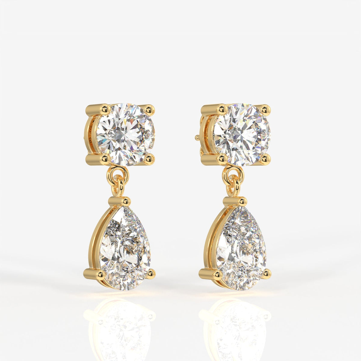 Round and Pear Cut Moissanite Diamond Dangle Sterling Silver Earrings