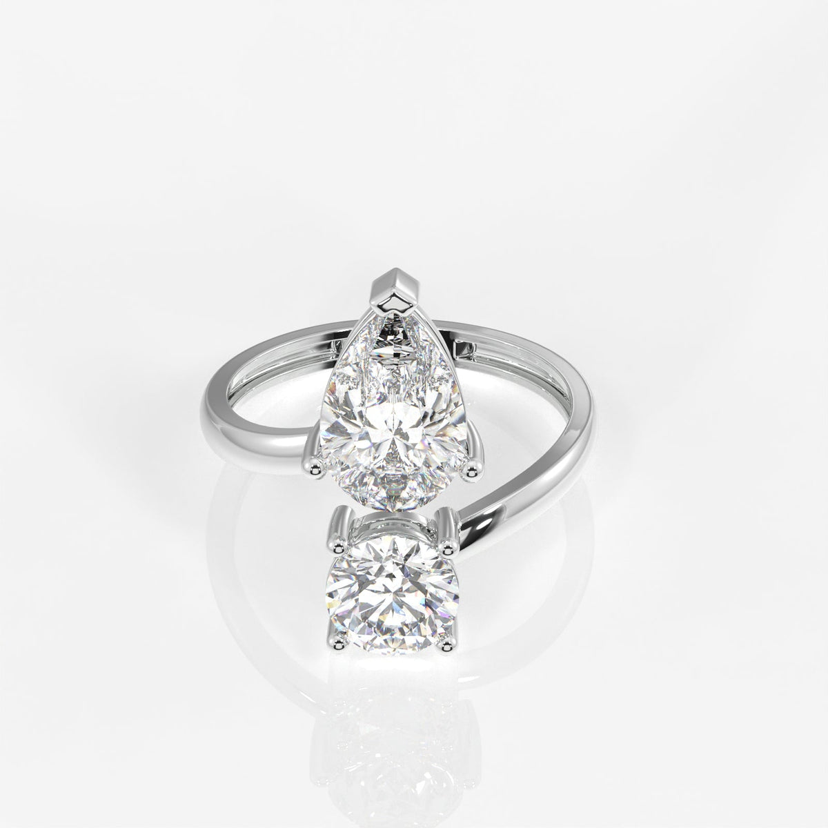 Round and Pear Cut Moissanite Diamond Toi - Et - Moi Sterling Silver Ring
