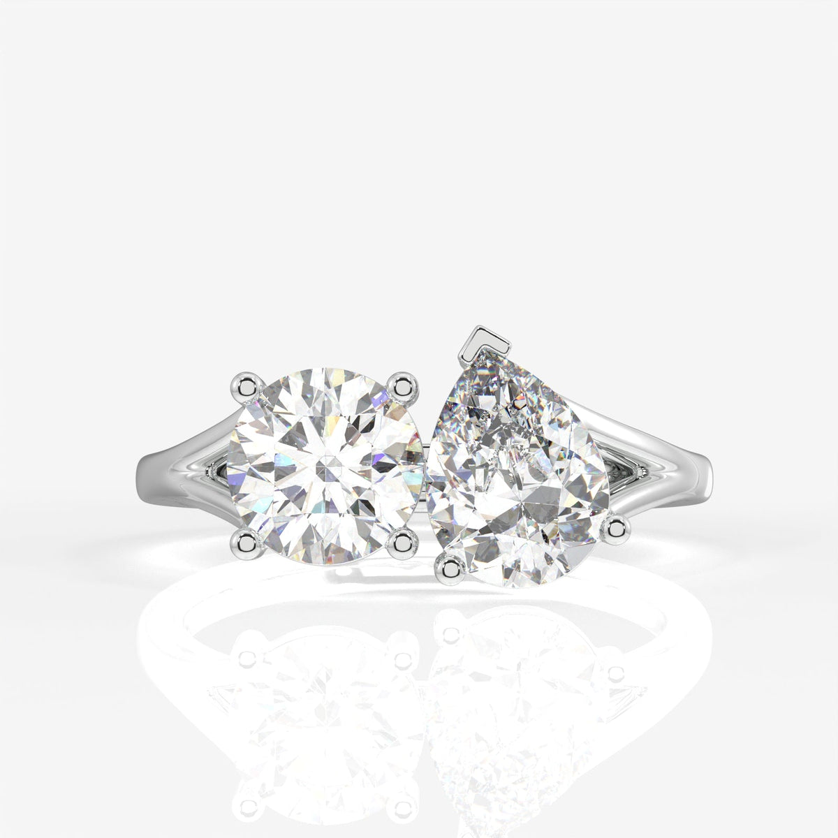 Round and Pear Cut Moissanite Diamond Toi - Et - Moi Sterling Silver Ring